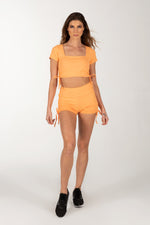 Orange Shorts Set with Cutout Back Design.