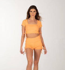 Orange Shorts Set with Cutout Back Design.