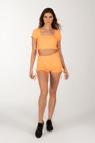 Orange Shorts Set with Cutout Back Design.